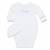 Carriage Boutique white newborn sleep sack with matching hat, featuring scalloped cuffs and custom name embroidery.