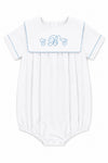 Carriage Boutique white cotton baby boy romper with blue trim and custom embroidered monogram on the sailor collar.