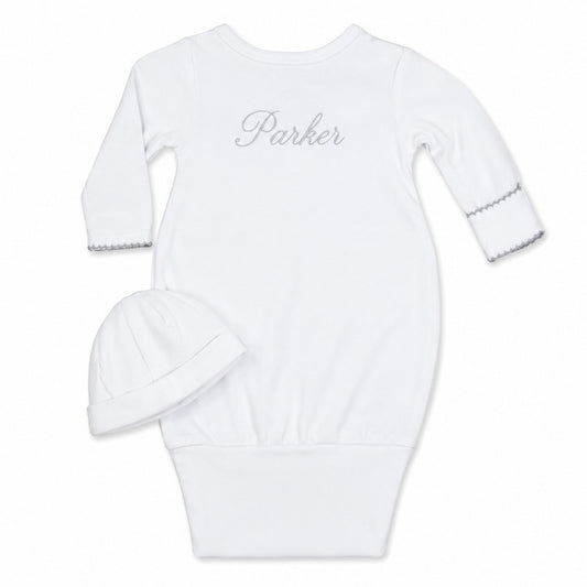 Carriage Boutique white newborn sleep sack with matching hat featuring personalized name embroidery and scalloped trim
