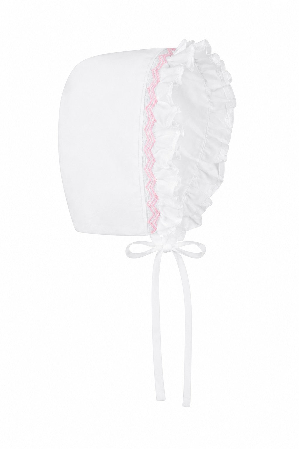Carriage Boutique white baby bonnet with delicate pink embroidery and ruffled trim for a christening gown