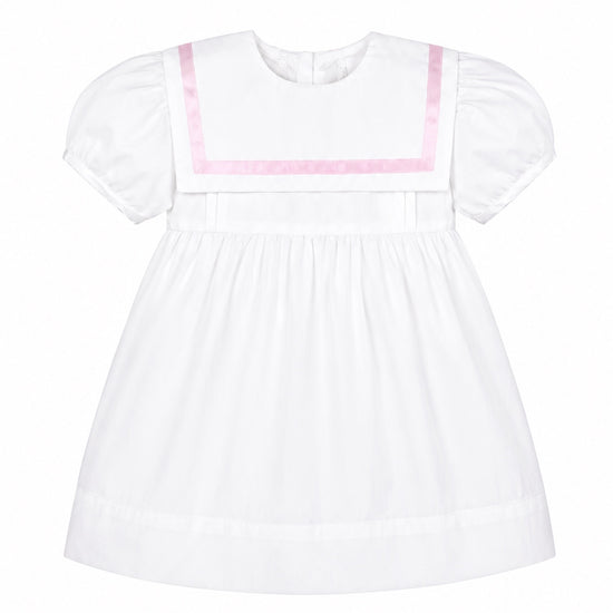 Carriage Boutique white and pink baby dress with short puff sleeves and a sailor-style collar in soft cotton