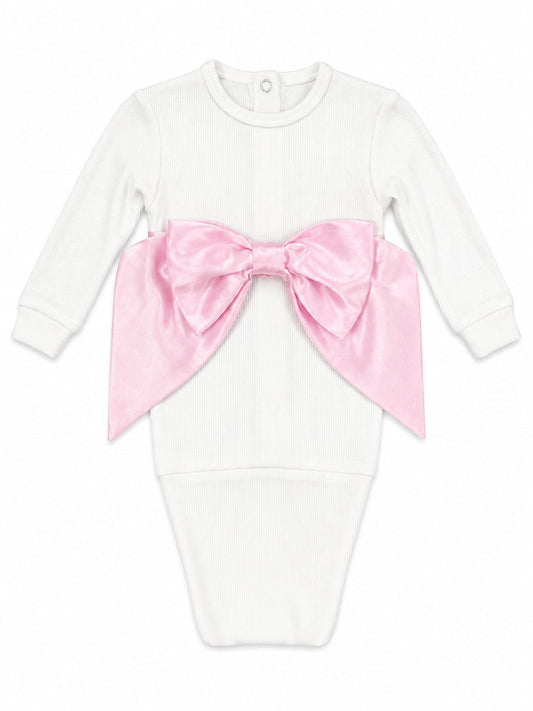 Carriage Boutique newborn baby girl white ribbed cotton swaddle bag featuring a large satin pink bow detail