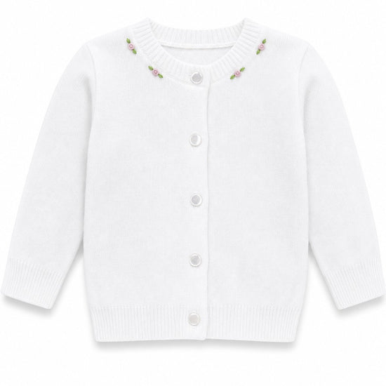 Carriage Boutique white cotton cashmere baby girl cardigan with delicate pink rosebud embroidery and button front.