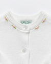 Carriage Boutique white cotton cashmere baby girl cardigan with delicate pink rosebud embroidery and crew neck