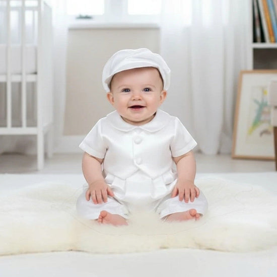 Carriage Boutique white satin vested baby boy romper with hat for christening or baptism. Short sleeves, button front.