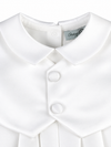 Carriage Boutique white satin christening romper featuring a Peter Pan collar and elegant fabric-covered buttons.