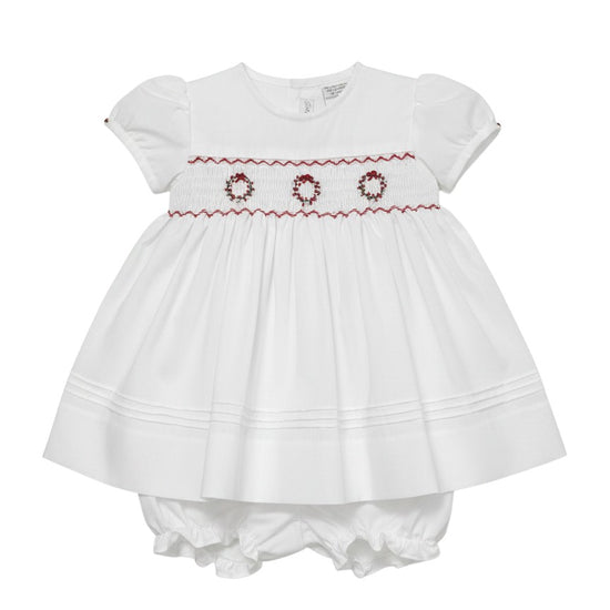 Carriage Boutique white cotton baby dress with red smocked wreath embroidery and matching bloomers