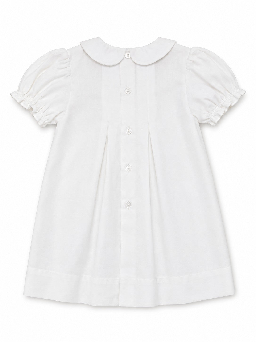 Carriage Boutique white heirloom baby dress featuring a Peter Pan collar, puffed sleeves, and back button closure.