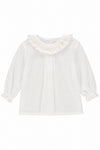 Carriage Boutique white baby girl long sleeve blouse with a delicate ruffled smocked collar and elastic wrists.
