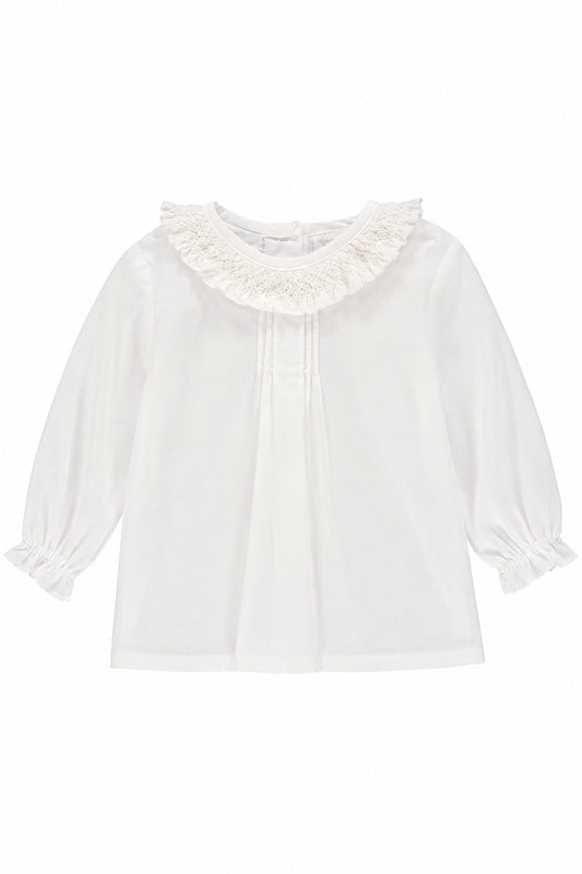Carriage Boutique white baby girl long sleeve blouse with a delicate ruffled smocked collar and elastic wrists.