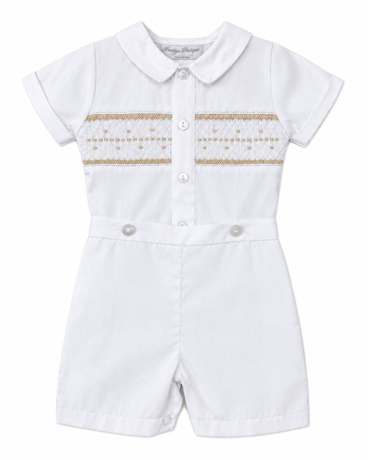 Carriage Boutique white baby boy bobby suit with hand smocked gold detailing, short sleeves, and snap crotch.