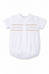 Carriage Boutique white baby boy christening bubble with smocked embroidery, Peter Pan collar, and button front.