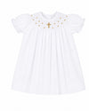 Carriage Boutique white cotton bishop dress with gold smocked cross detail and puffed sleeves for christening