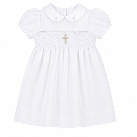 Carriage Boutique white baby girl christening dress with smocked bodice, cross embroidery, and peter pan collar.
