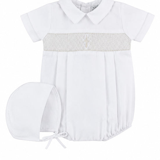 Carriage Boutique white baby boy christening bubble romper with smocked bodice, cross embroidery, and matching bonnet.