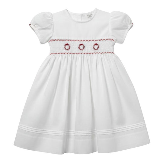 Carriage Boutique white cotton toddler dress with red floral smocking and puff sleeves