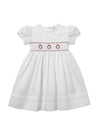 Carriage Boutique white cotton toddler dress with red floral smocking and puff sleeves