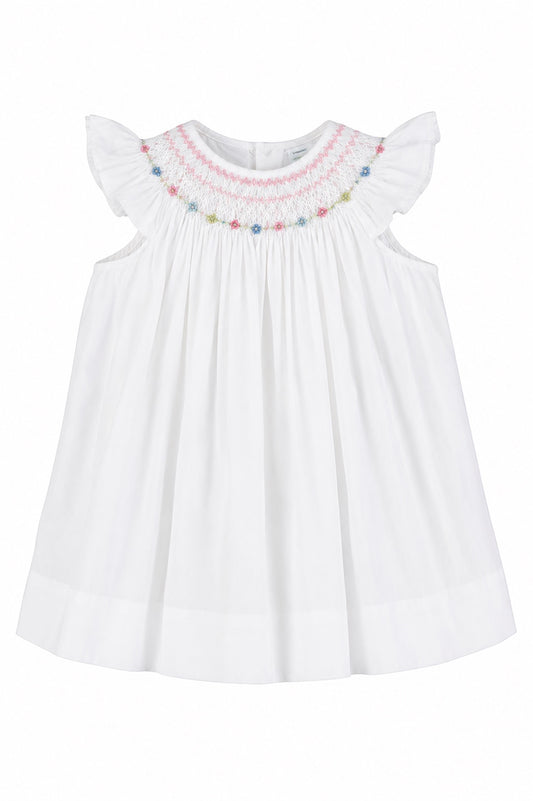 Carriage Boutique white baby girl bishop dress with hand-smocked floral embroidery and flutter sleeves.